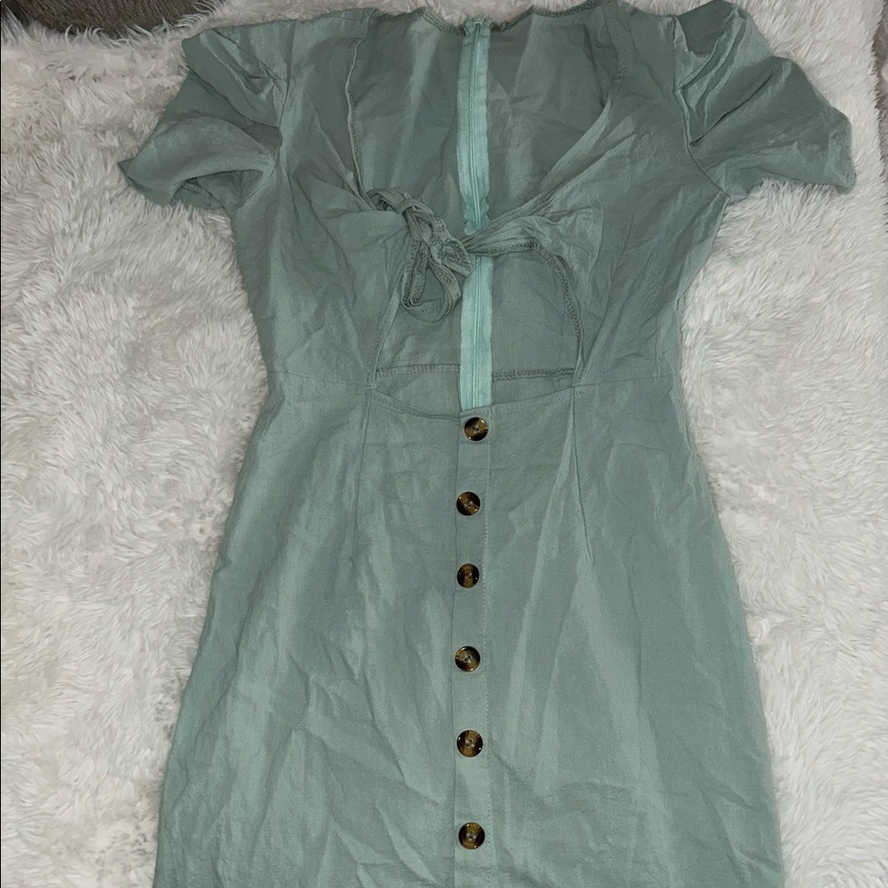 Short dress with cut out and tie